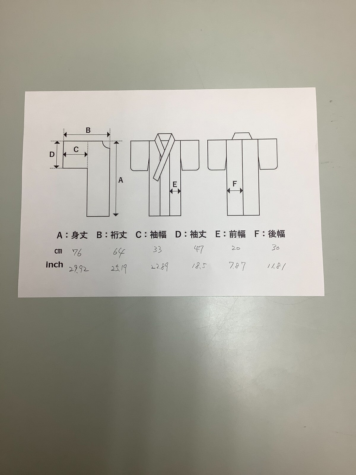 32077